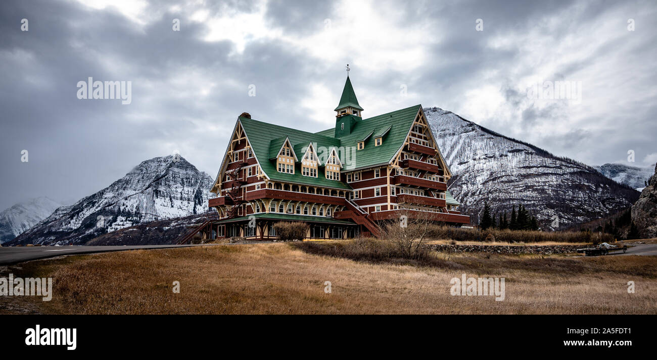 Historic Canadian hotel in snowy rocky mountains. Stock Photo