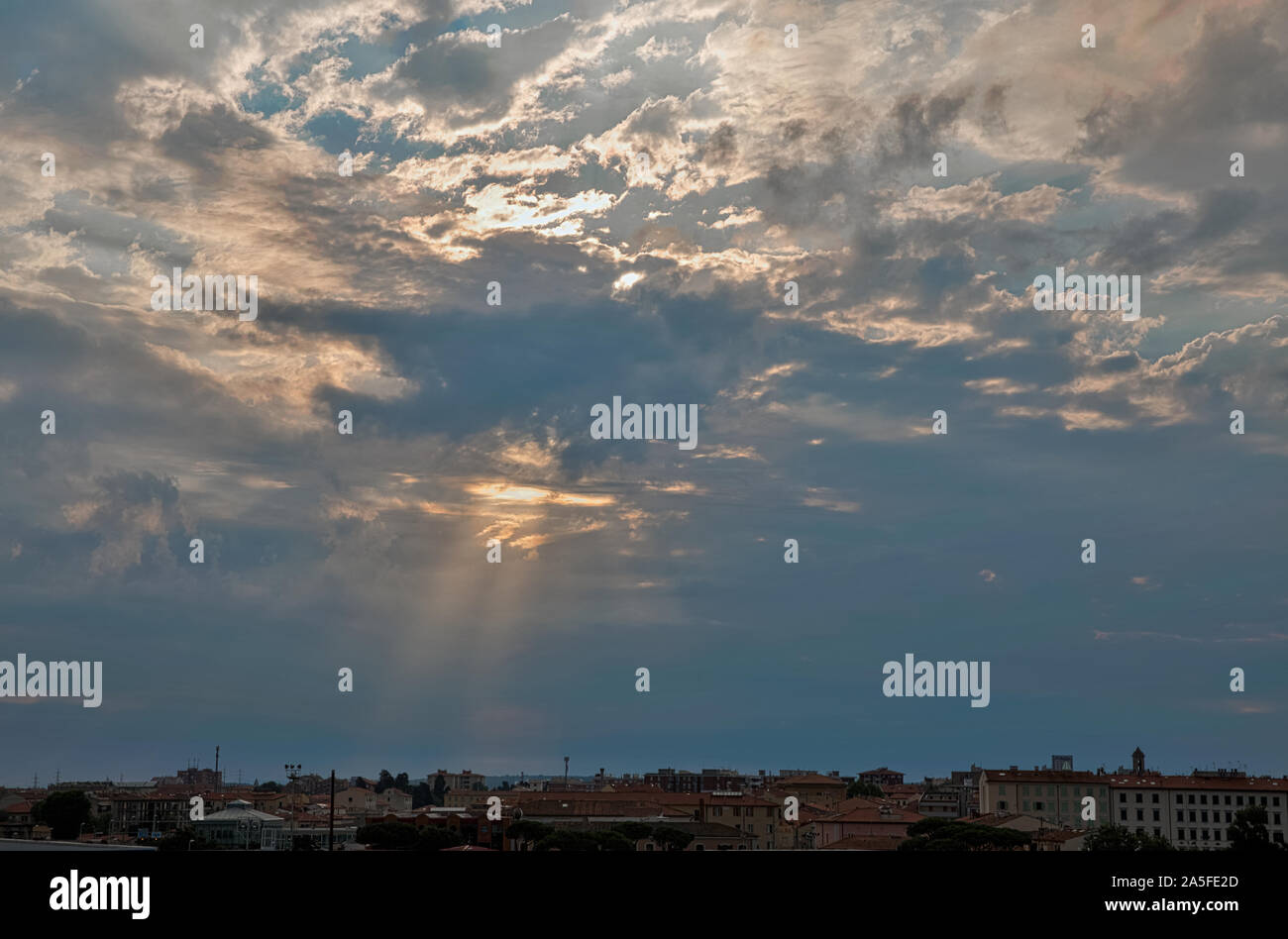 Dramatic sky with sun rays over Livorno, Italy. HDR Stock Photo - Alamy