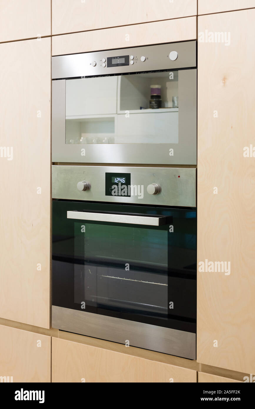 Interior of modern kitchen with built-in appliances Stock Photo