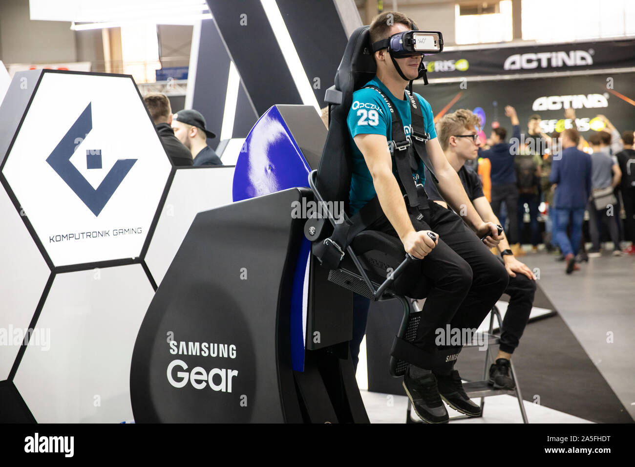 POZNAN, POLAND - October, 18th 2019: Man are using samsung VR kit at PGA 2019. PGA2019 is a computer games and entertainment event organized in polish Stock Photo