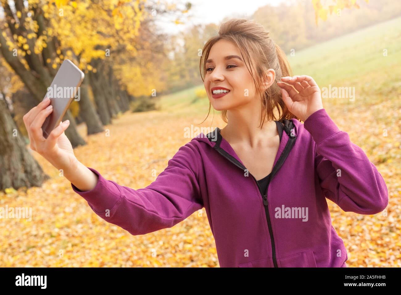 Outdoors Leisure Girl Standing In The Autumn Park Taking Selfie On 