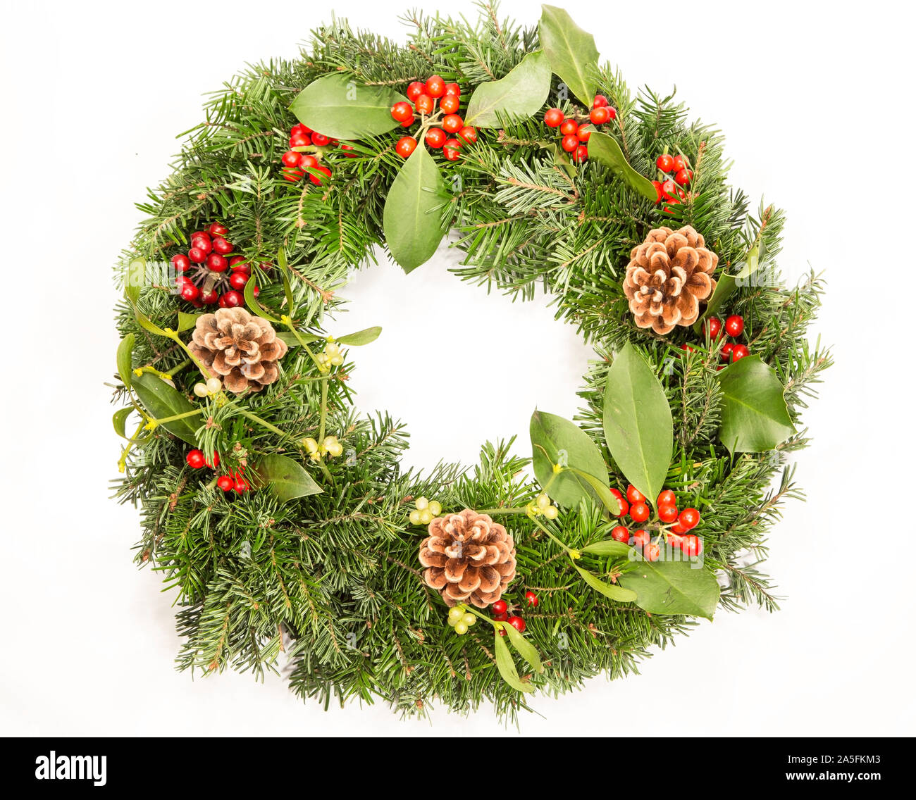 Christmas wreath isolated on white background Stock Photo - Alamy