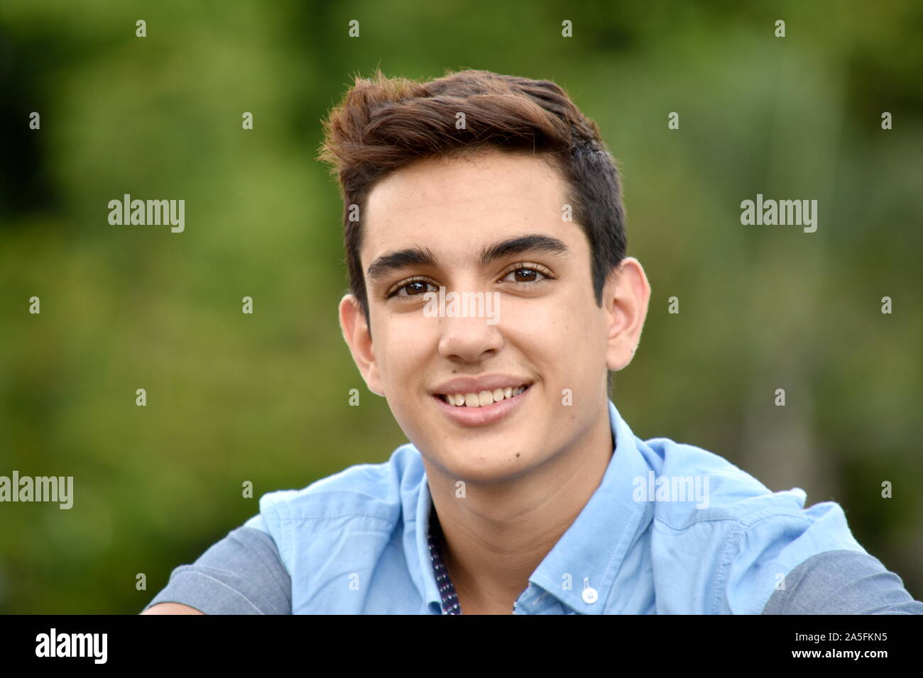 Teenage smiling male hi-res stock photography and images - Alamy