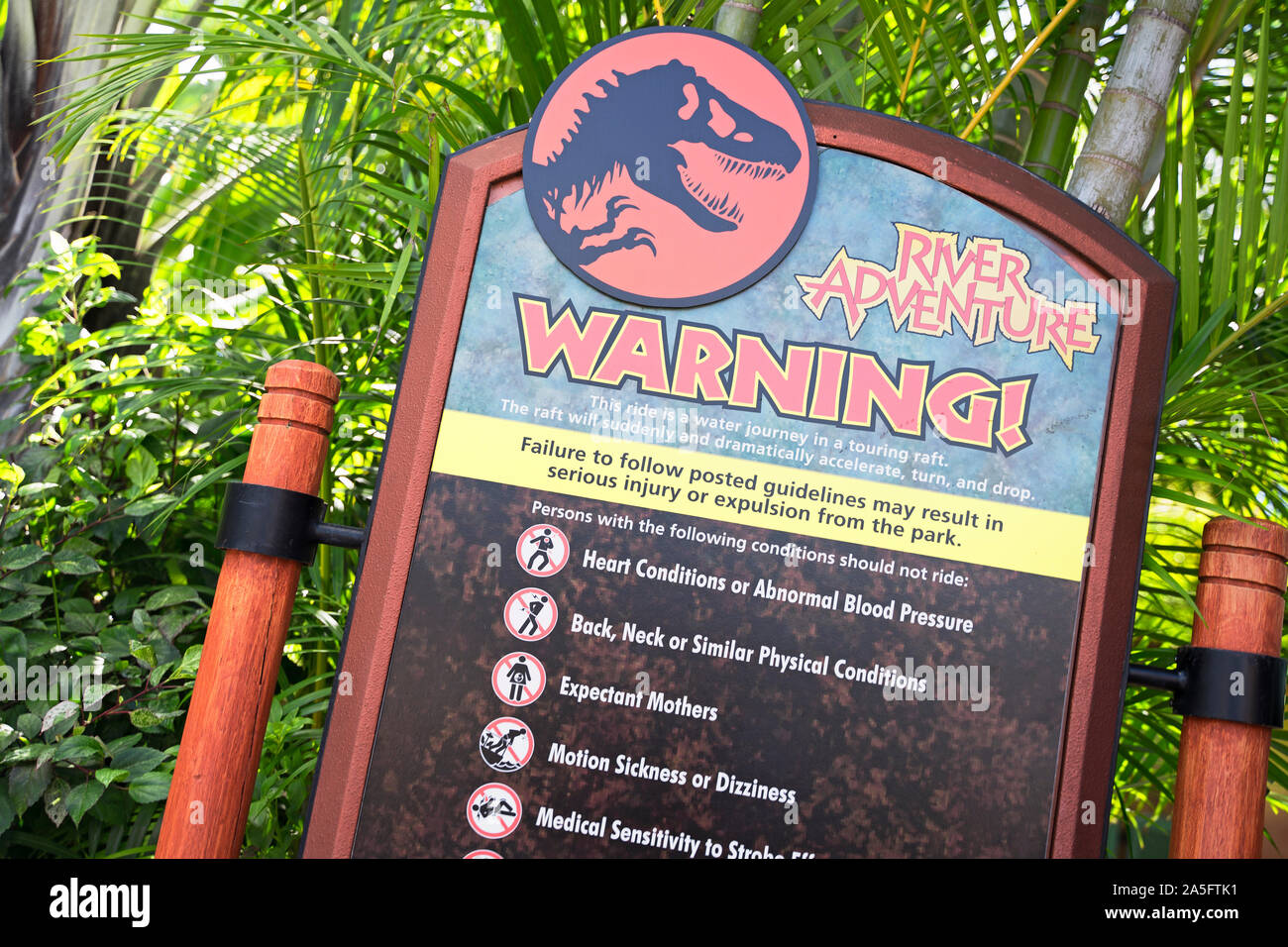 River Adventure, Jurassic Ride Warning Sign, Health Conditions Guidelines Sign, Islands of Adventure, Universal Studios Resort, Orlando, Florida, USA Stock Photo