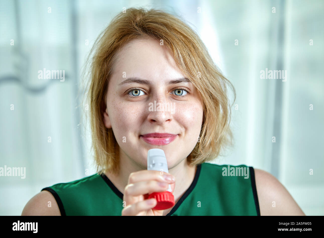 The use fixed-dose combination inhaler  in the treatment of COPD or asthma attack. Inhalation with budesonide and formoterol is maintenance and reliev Stock Photo