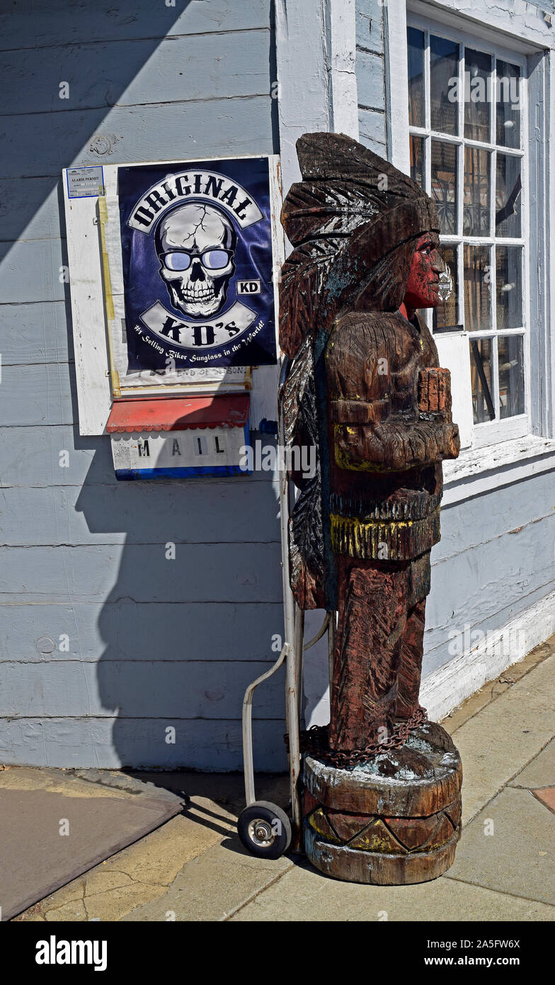 statue of a native American in front of the Devils Workshop Mercantile shop, in Niles, California Stock Photo