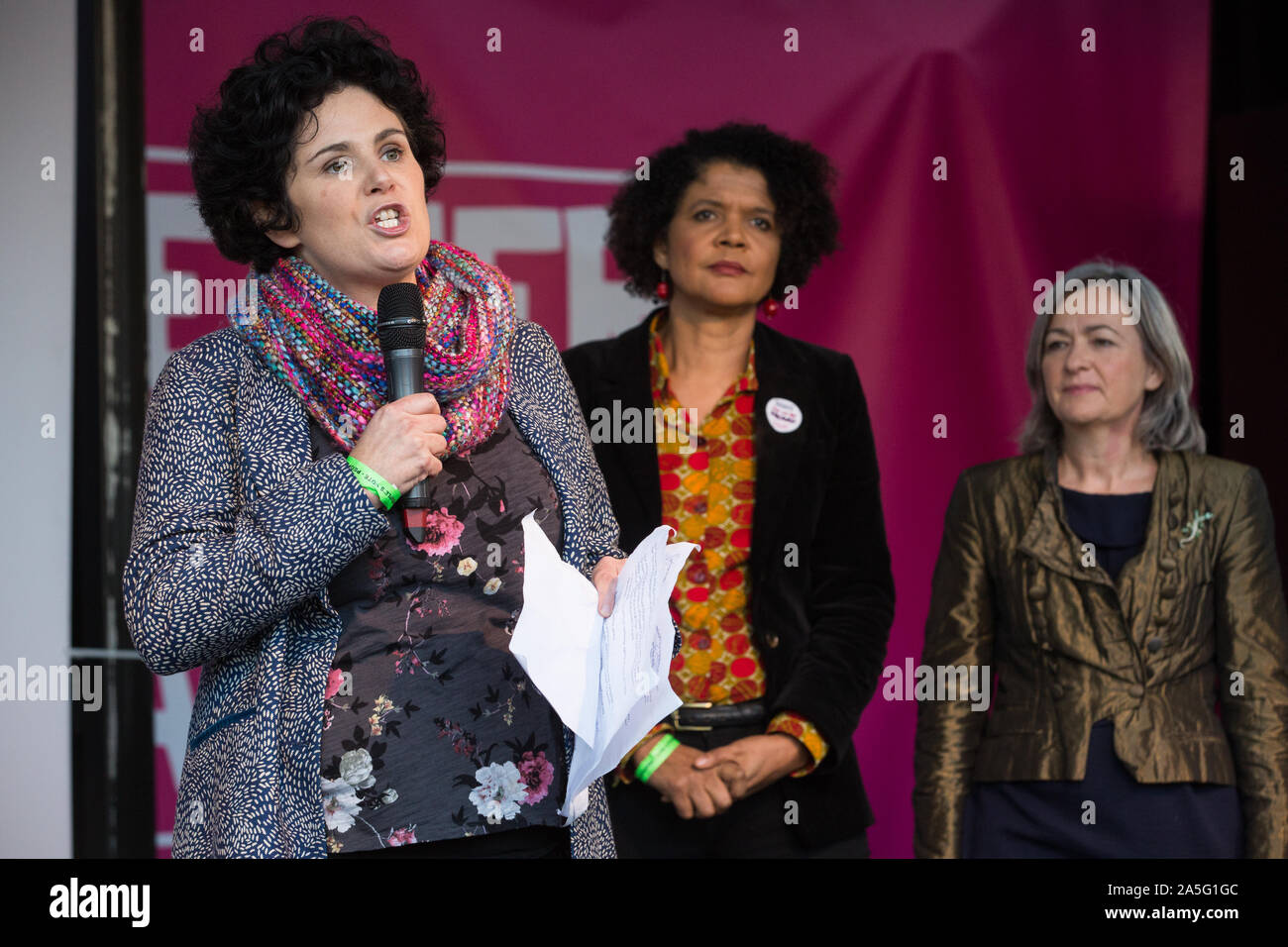 London, UK. 19 October, 2019. Claire Hanna, MLA for Belfast South, seen here with Chi Onwurah MP and Liz Saville Roberts MP, addresses hundreds of tho Stock Photo