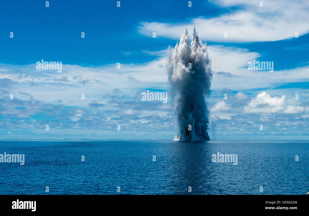 191014-N-SS432-0217  PACIFIC OCEAN (Oct. 17, 2019) Sailors assigned to Underwater Construction Team TWO (UCT 2) Construction Dive Detachment /Bravo (CDD/B) detonate explosives on an obstruction in the Sapwauhfik Atoll, Federated States of Micronesia on Oct. 17, 2019 as part of Triggerfish 2019 phase III. Triggerfish is a U.S. Third Fleet-led mission that employs expeditionary forces to conduct hydrographic surveys and clear hazards to navigation in the Federated States of Micronesia in order to ensure a free and open Indo-Pacific. (U.S. Navy photo by Mass Communication Specialist 2nd Class Oma Stock Photo