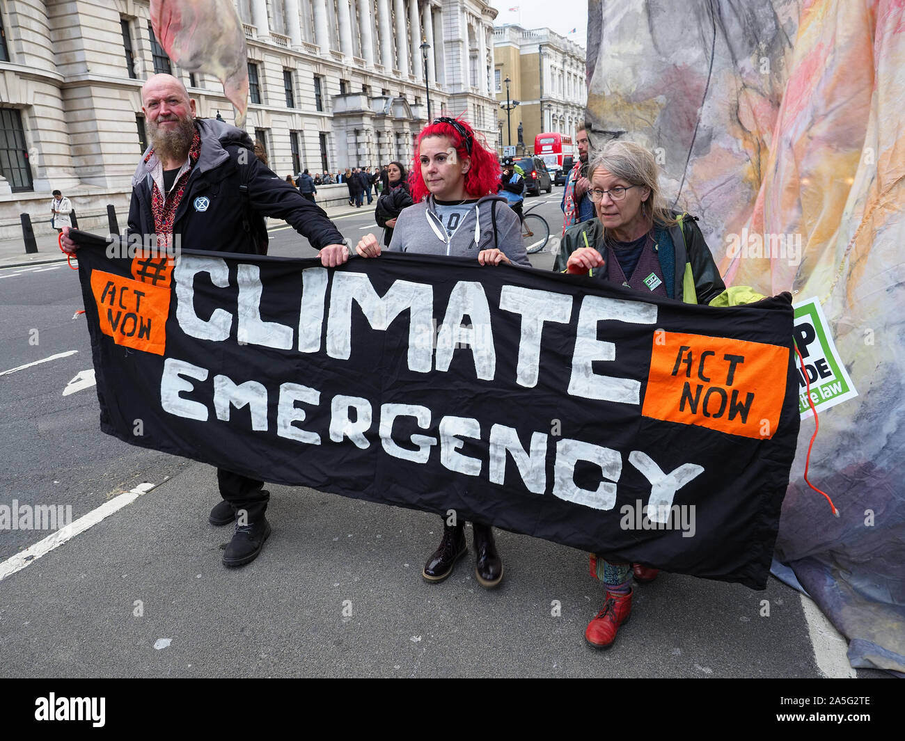 View of extinction rebellion protesters marching down Whitehall in London during a march on Friday 18 October 2019 Stock Photo