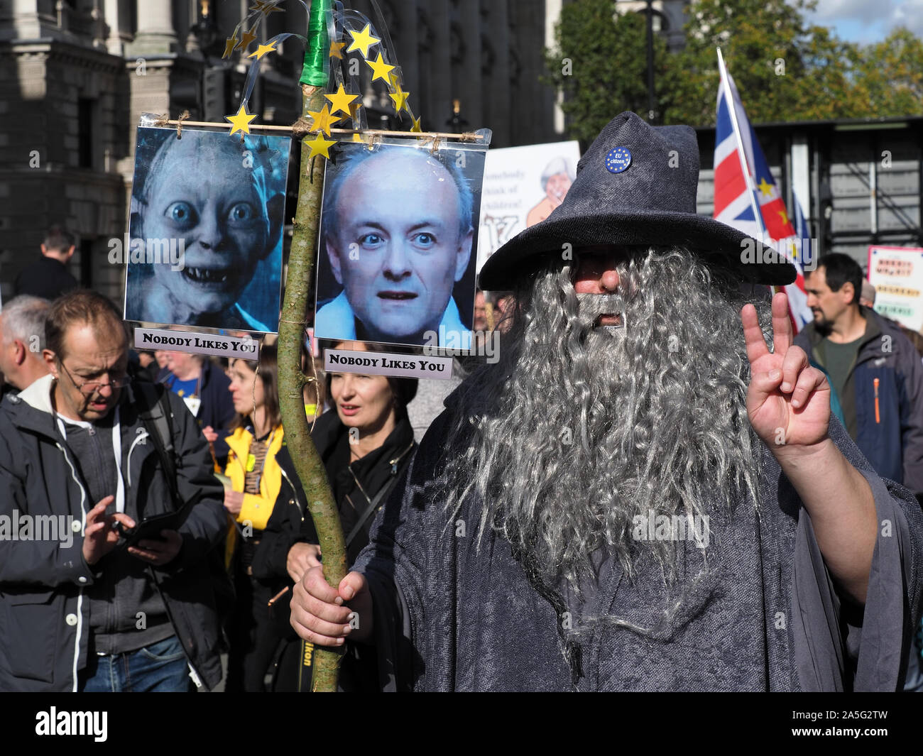 View of an anti Brexit protester mocking Dominic Cummings outside Parliament in London during the People’s Vote March on Saturday 19 October 2019 Stock Photo