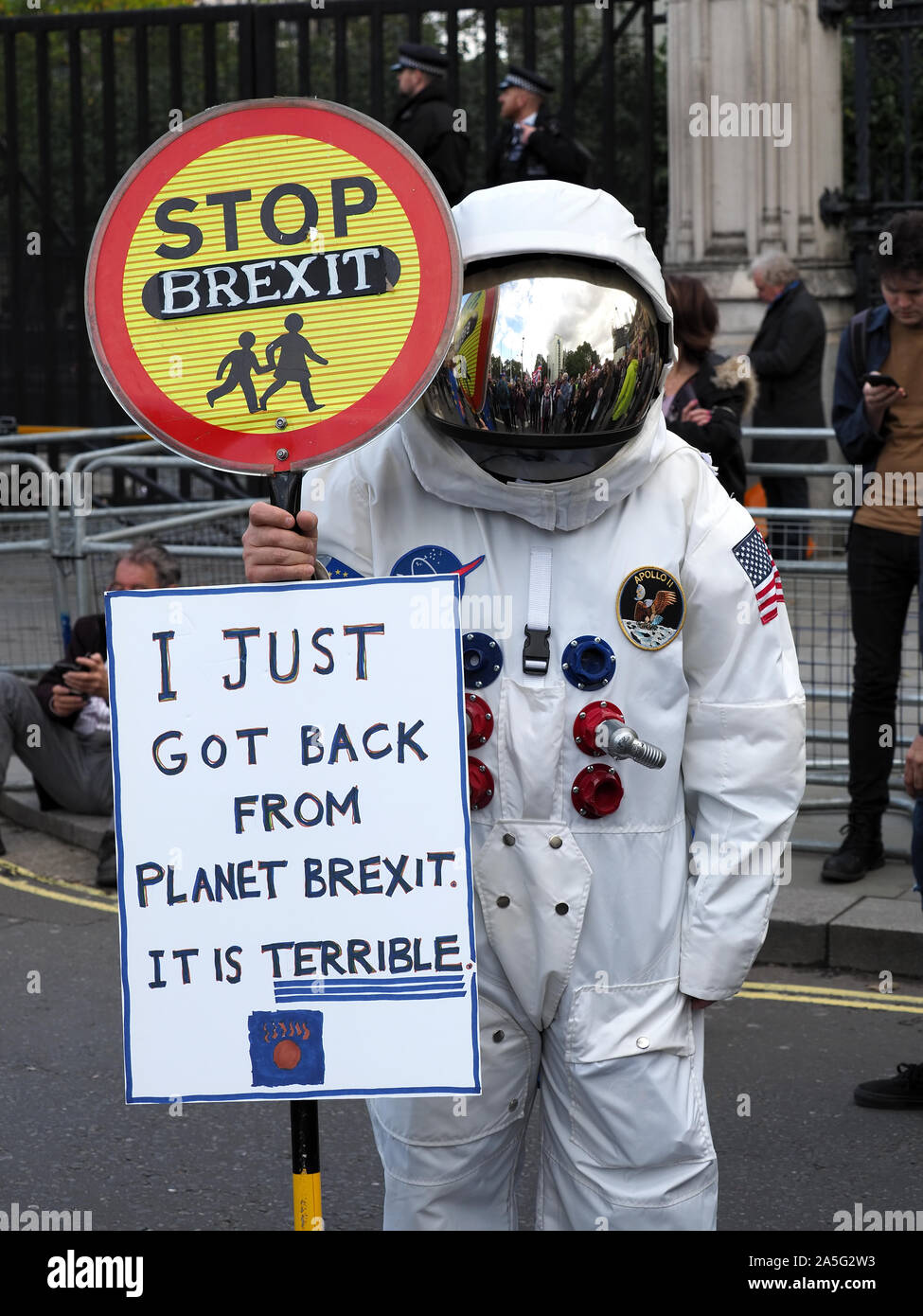View of an anti Brexit protester dressed as an astronaut outside Parliament during the People’s Vote March in London on Saturday 19 October 2019 Stock Photo