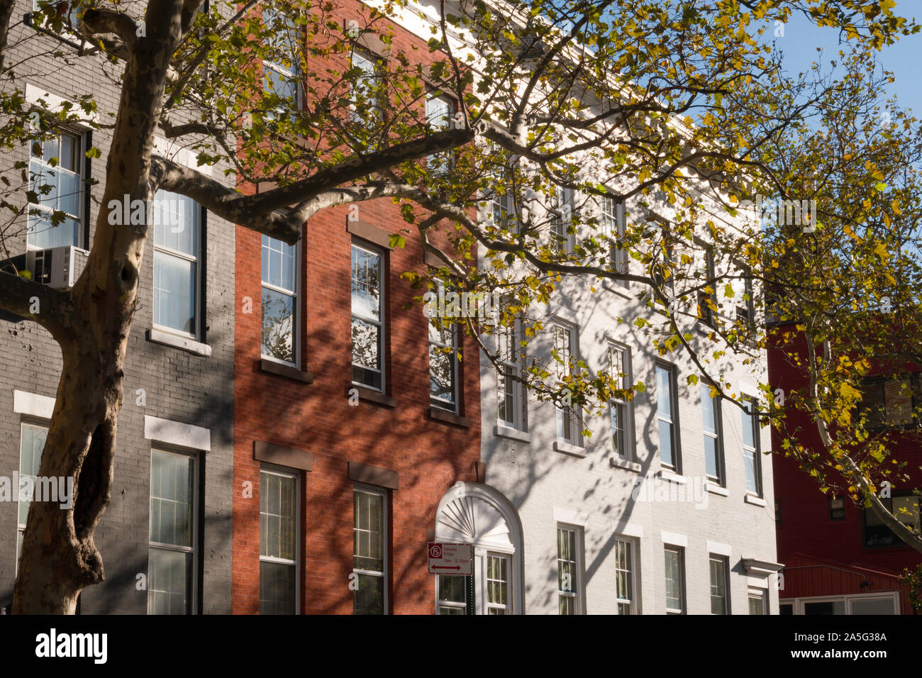 Colorfully Painted Brownstones on  MacDougal Street in Greenwich Village, NYC, USA Stock Photo