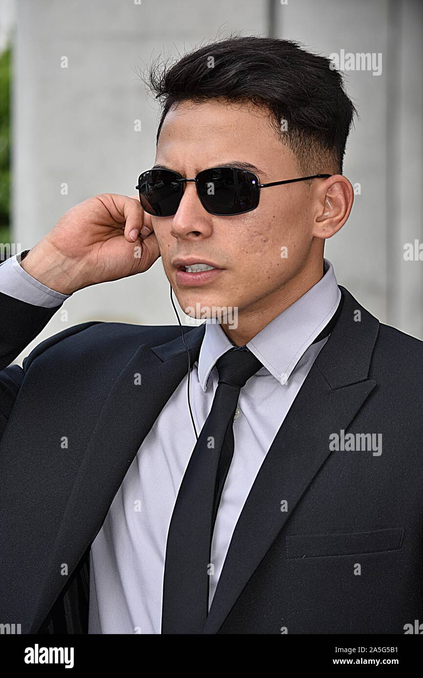 Unemotional Handsome Security Guard Wearing Sunglasses Stock Photo Alamy