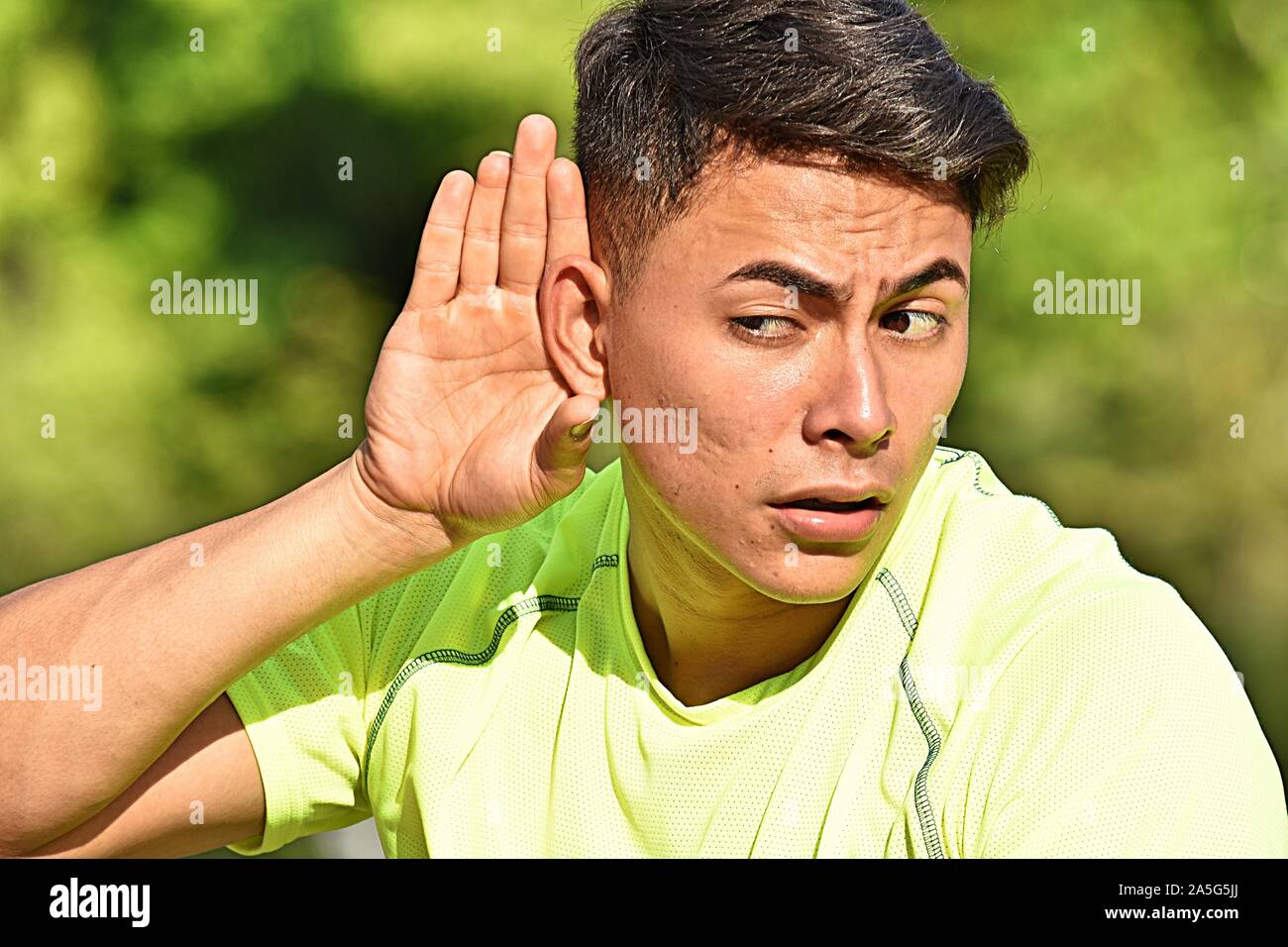 An Athletic Man Hearing Stock Photo