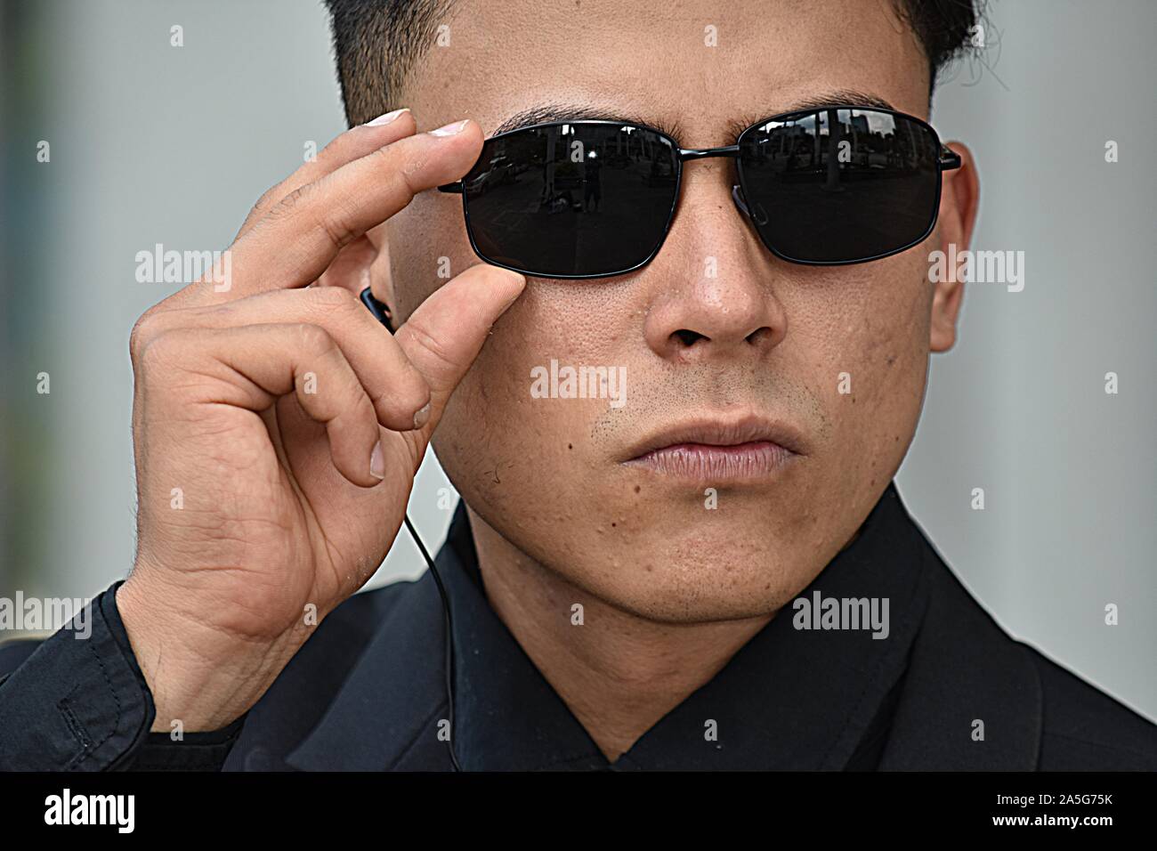 Security Guard Looking Wearing Sunglasses Stock Photo Alamy