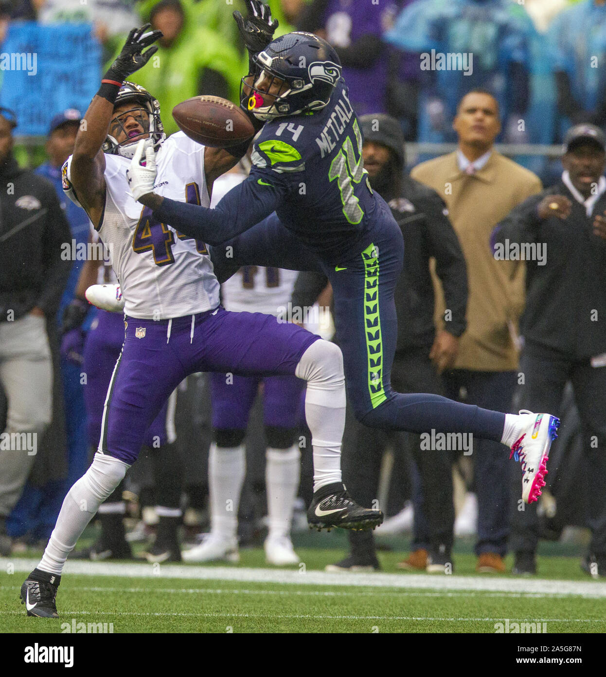 Seattle, United States. 20th Oct, 2019. Baltimore Ravens cornerback Marlon Humphrey (44) breaks up a pass intended for Seattle Seahawks wide receiver D.K. Metcalf (14) during the first quarter at CenturyLink Field on Sunday, October 20, 2019 in Seattle, Washington. Ravens and Seahawks tie13-13 at halftime in Seattle. Photo by Jim Bryant/UPI Credit: UPI/Alamy Live News Stock Photo