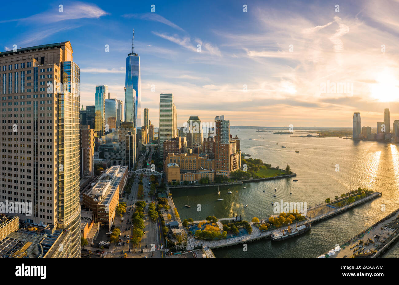 Aerial view of Lower Manhattan skyline at sunset Stock Photo