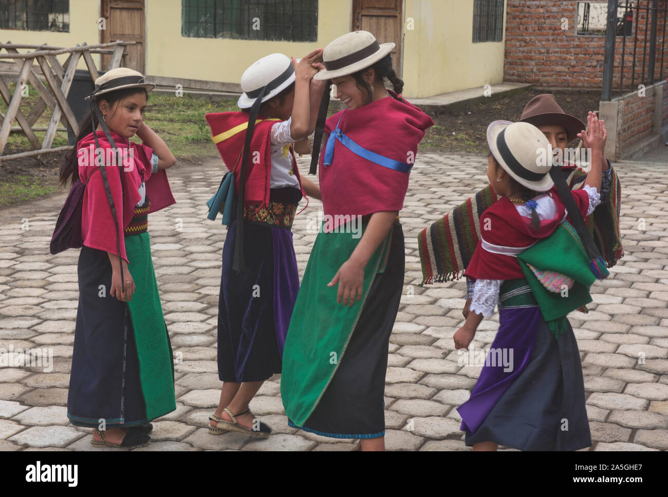Indigenous highland kids dancing, La Moya, Ecuador Stock Photo