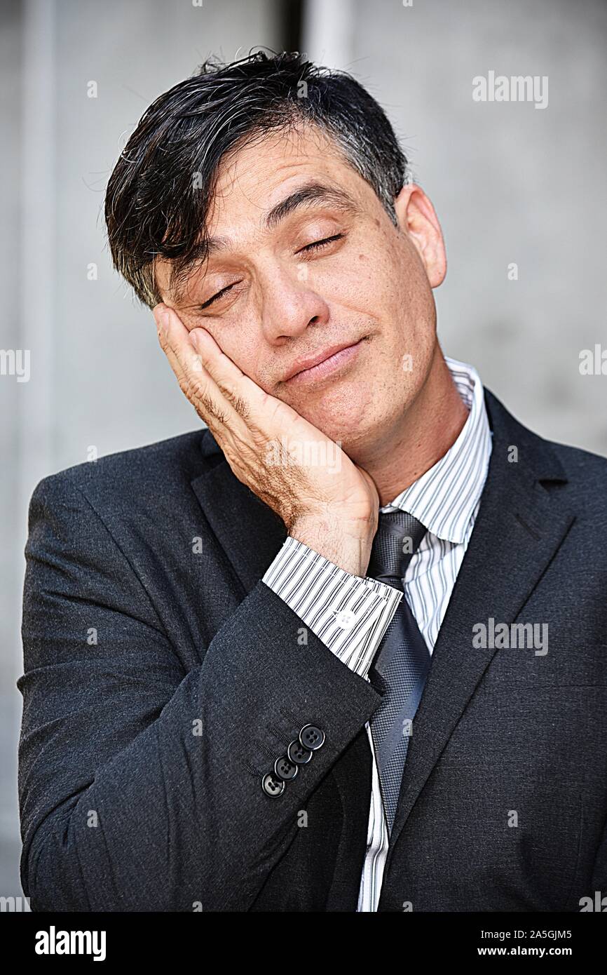 Sleepy Adult Businessman Wearing Suit And Tie Stock Photo - Alamy