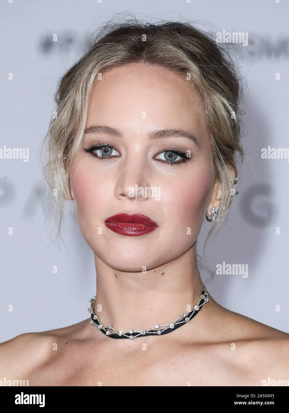 (FILE) Jennifer Lawrence marries Cooke Maroney. Jennifer Lawrence and Cooke Maroney tied the knot Saturday night at Belcourt of Newport, a pretty spectacular Rhode Island mansion. Among the guests were Ashley Olsen, Kris Jenner, Emma Stone, Corey Gamble, Cameron Diaz, Nicole Richie and Sienna Miller. WESTWOOD, LOS ANGELES, CALIFORNIA, USA - DECEMBER 14: Actress Jennifer Lawrence wearing a Dior dress, Christian Louboutin, and Beladora and Repossi jewels arrives at the World Premiere Of Columbia Pictures 'Passengers' held at the Regency Village Theatre on December 14, 2016 in Westwood, Los Angel Stock Photo