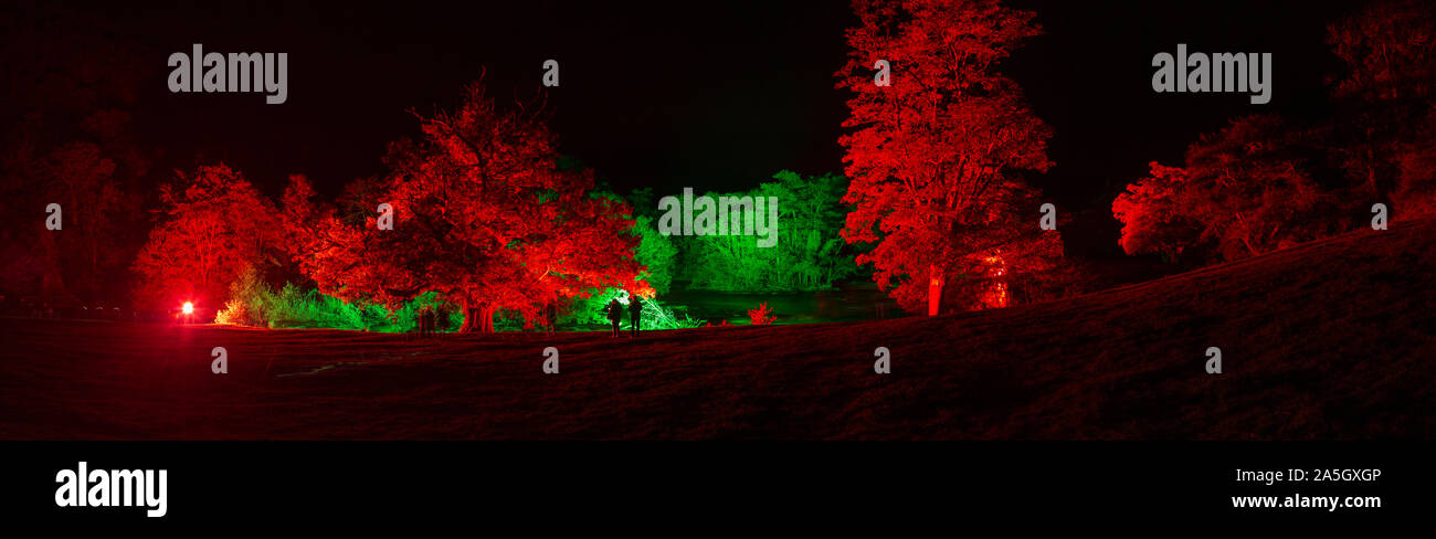 Night time illuminations of trees and river at Horseshoe Falls, River Dee, Llangollen, North Wales Stock Photo