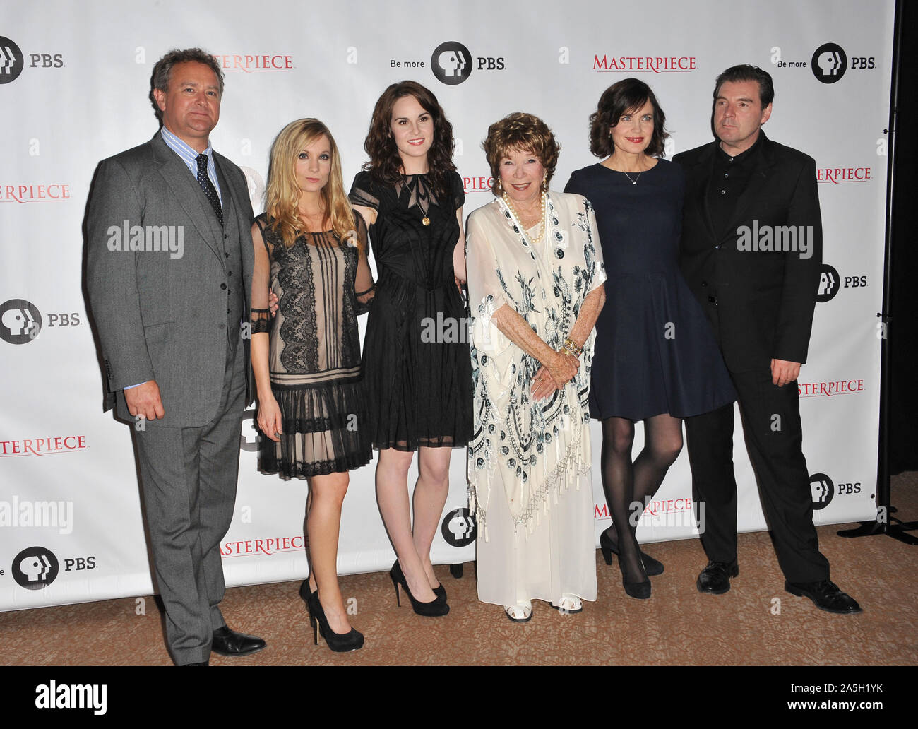 LOS ANGELES, CA. July 21, 2012: LtoR: Downton Abbey stars Hugh Bonneville, Joanne Froggatt, Michelle Dockery, Shirley MacLaine, Elizabeth McGovern & Brendan Coyle at photocall for the third series of Downton Abbey at the Beverly Hilton Hotel. © 2012 Paul Smith / Featureflash Stock Photo