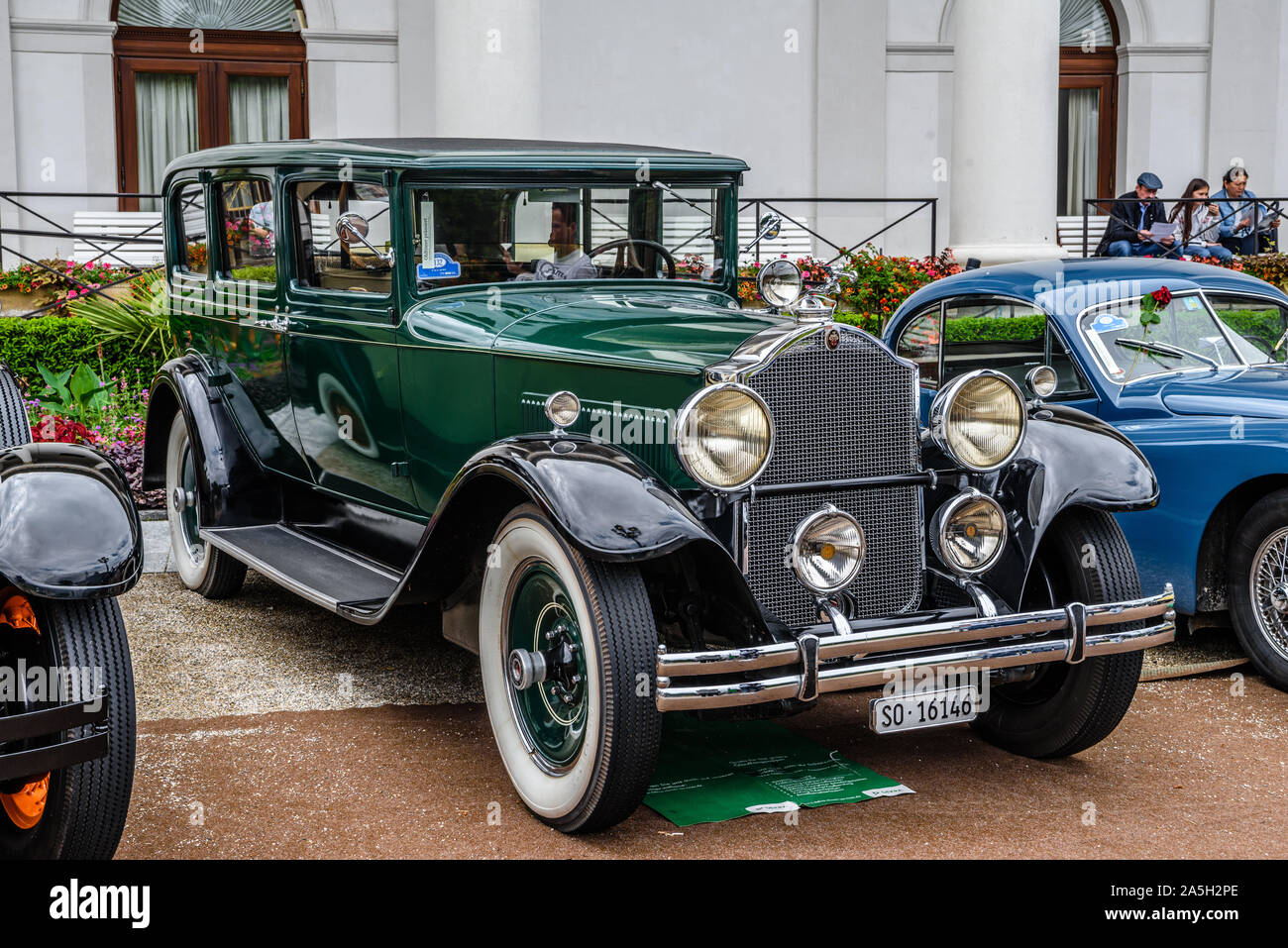 BADEN BADEN, GERMANY - JULY 2019: dark green PACKARD DE LUXE EIGHT 904 Sedan Limousine 1932, oldtimer meeting in Kurpark. Stock Photo