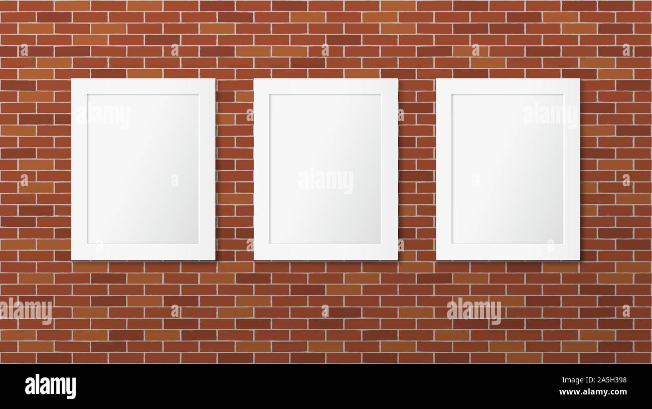 Three white frames on a brick wall Stock Vector