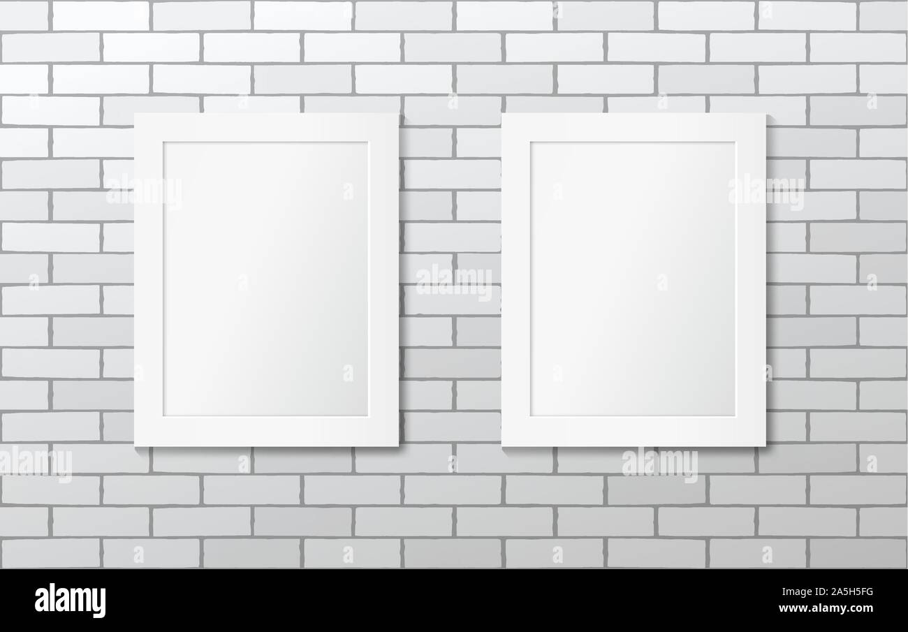 Two white picture frames on a white brick wall Stock Vector