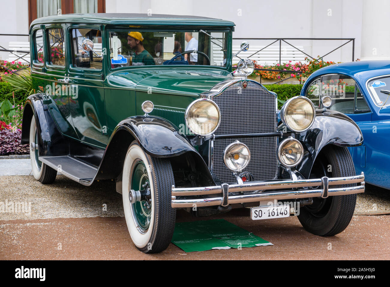 BADEN BADEN, GERMANY - JULY 2019: dark green PACKARD DE LUXE EIGHT 904 Sedan Limousine 1932, oldtimer meeting in Kurpark. Stock Photo