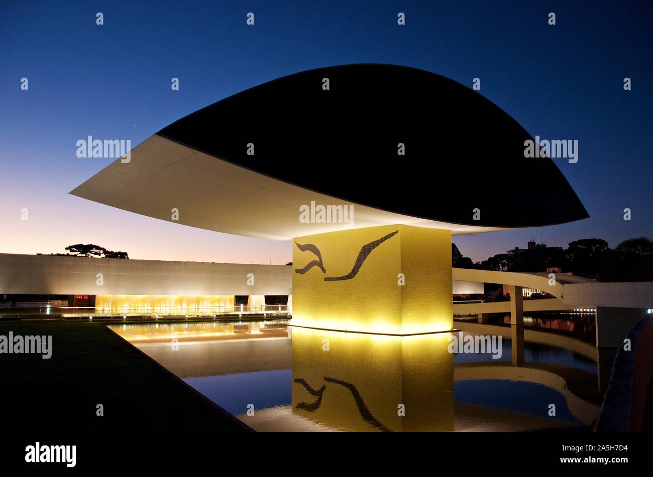 Beautiful shot of the Oscar Niemeyer Museum with a blue sky in the background in Brazil Stock Photo