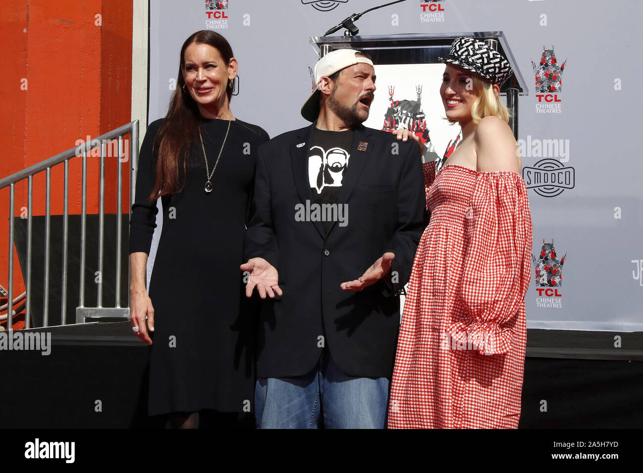 October 14, 2019, Los Angeles, CA, USA: LOS ANGELES - OCT 14:  Jennifer Schwalbach Smith, Kevin Smith, Harley Quinn Smith at the Kevin Smith And Jason Mewes Hand And Footprint Ceremony at the TCL Chinese Theater on October 14, 2019 in Los Angeles, CA (Credit Image: © Kay Blake/ZUMA Wire) Stock Photo