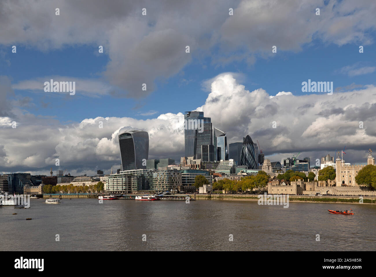 View across the River Thames in London, the Tower Of London on the right, and the modern skyline, with the Walkie Talkie building in the background. Stock Photo
