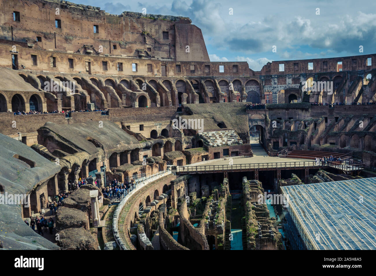 Interior view of the Colosseum (Coliseum) known as the Flavian Amphitheatre. Arena and hypogeum. One of the main attractions of the city. Stock Photo