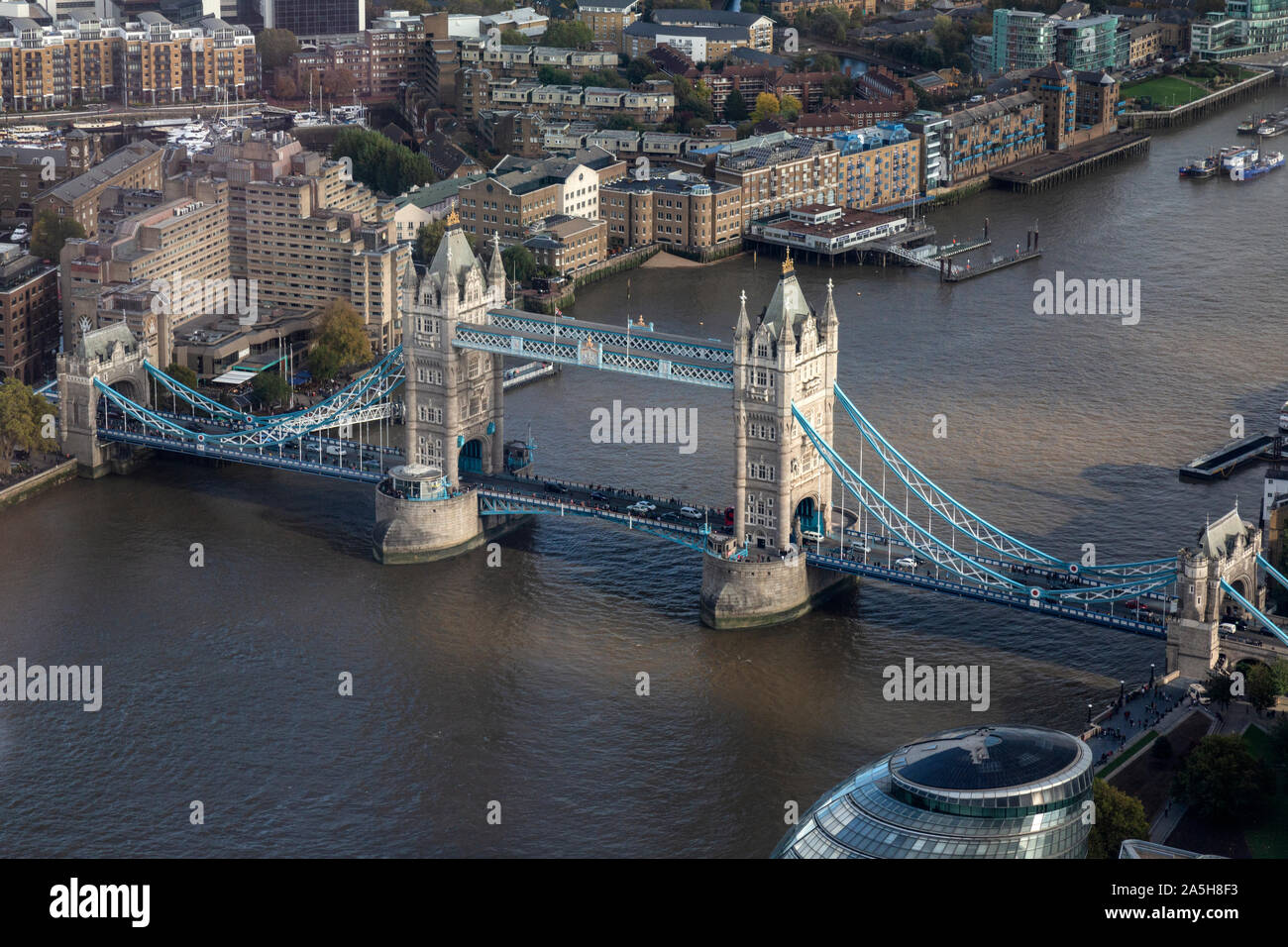 An aerial view looking down on Tower Bridge across the River Thames in London, England. Stock Photo