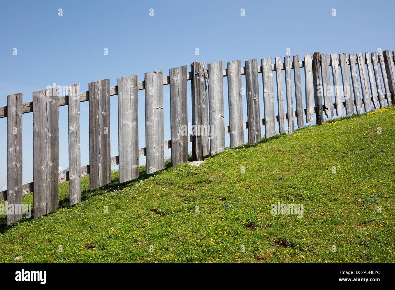 Wooden fence on the hill, Alps, Tyrol, Austria, Europe Stock Photo