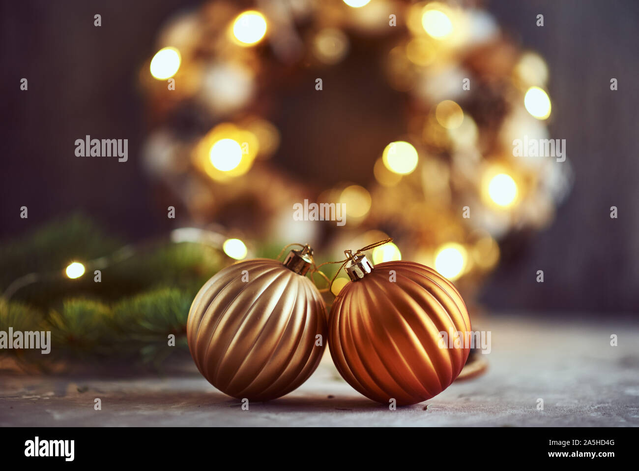 Christmas decorations with golden balls, fir tree branch and garland ...
