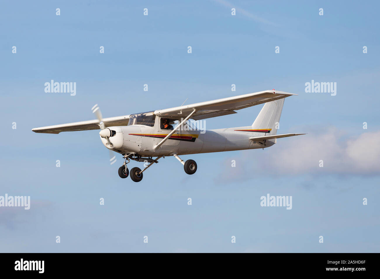 sports aiplane flying mid air Stock Photo