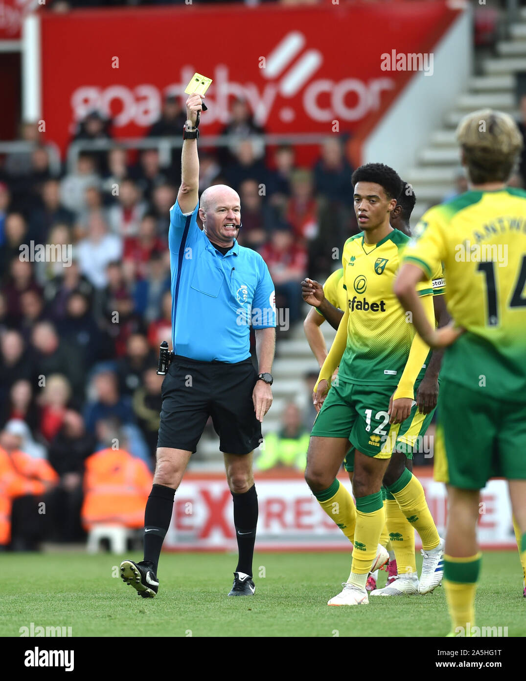 Referee Lee Morris shows Jamal Lewis of Norwich a yellow card during the Premier League match between AFC Bournemouth and Norwich City at the Vitality Stadium Stadium , Bournemouth , 19 October 2019 Photo Simon Dack / Telephoto Images. -  Editorial use only. No merchandising. For Football images FA and Premier League restrictions apply inc. no internet/mobile usage without FAPL license - for details contact Football Dataco Stock Photo