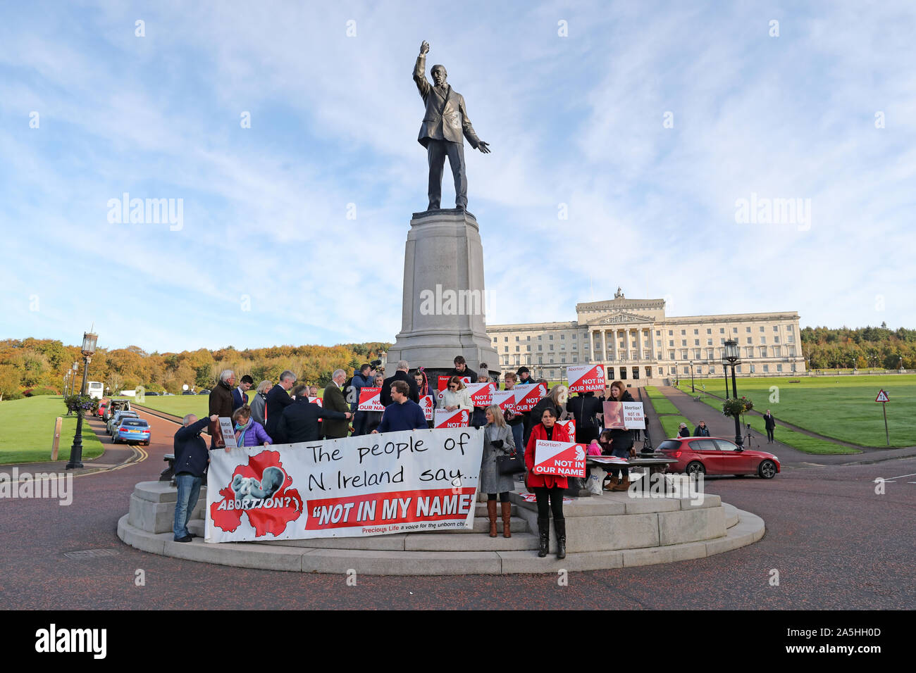 Members of Pro Life take part in a photocall in the grounds of Stormont Parliament, Belfast, the Stormont Assembly will sit for the first time in two and half years later after it was recalled by MLAs wishing to protest at changes to Northern Ireland's abortion laws. Stock Photo