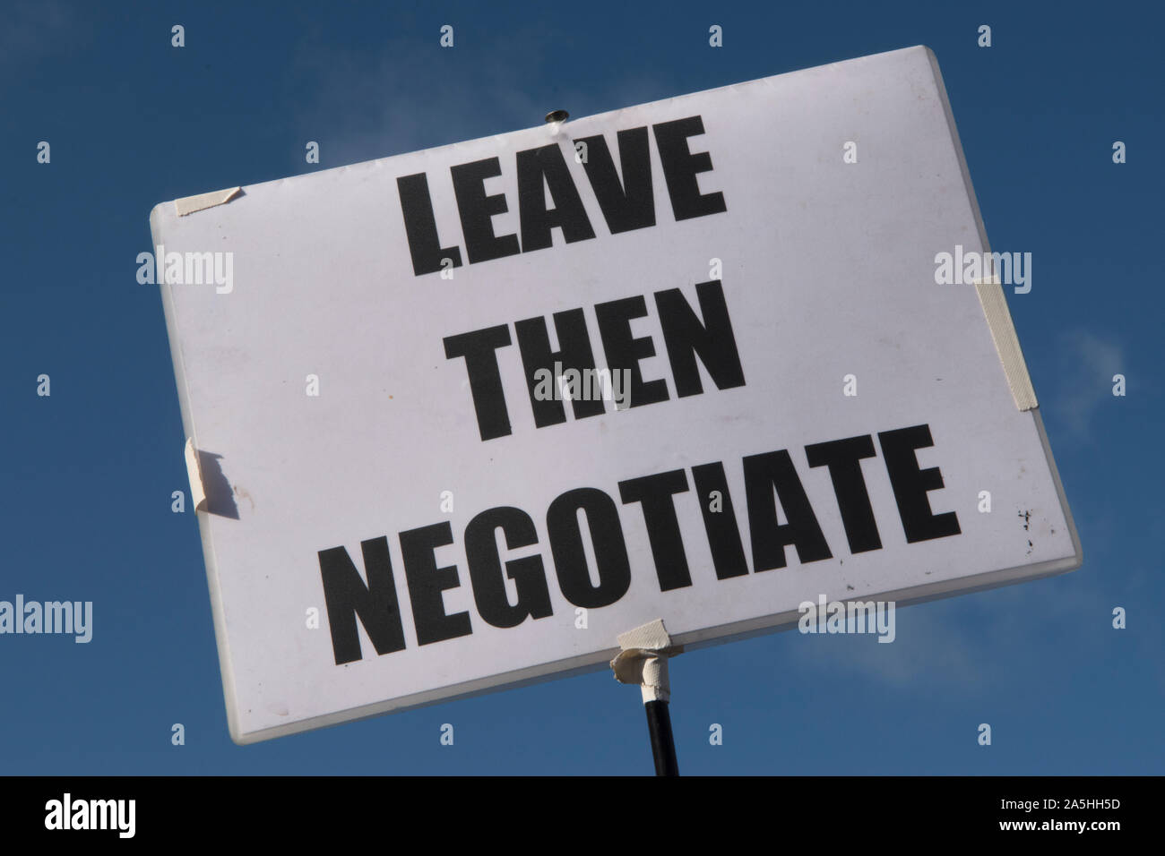Leave Europe Then Negotiate with the EU. Brexit supporting poster banner at the Peoples Vote Campaign demonstration. Brexit Super Saturday 19 October 2019  Parliament Square London UK. HOMER SYKES Stock Photo