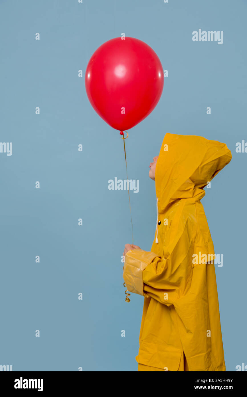 Boy in yellow coat from it hotsell