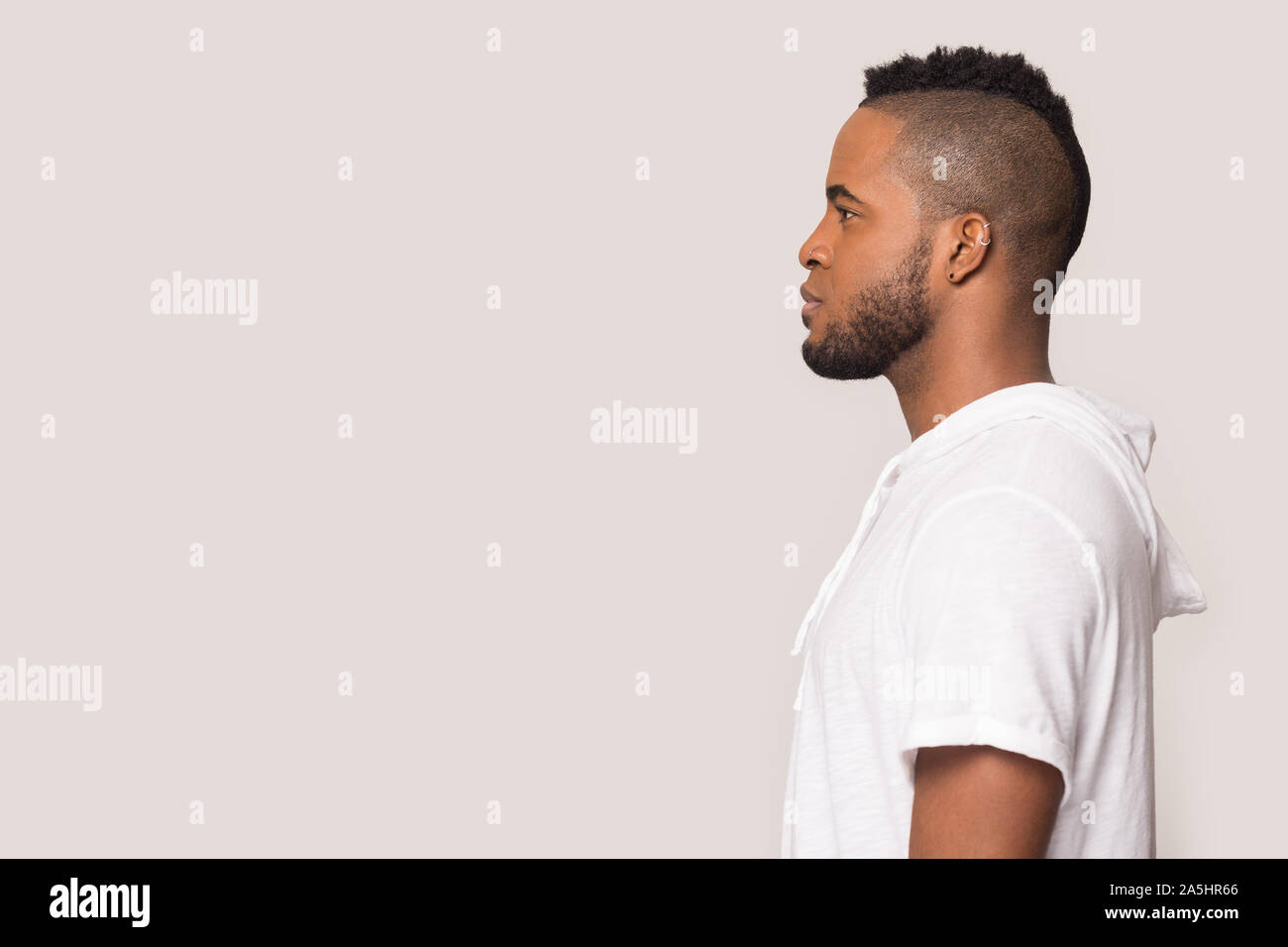 African American man in profile look at copy space Stock Photo