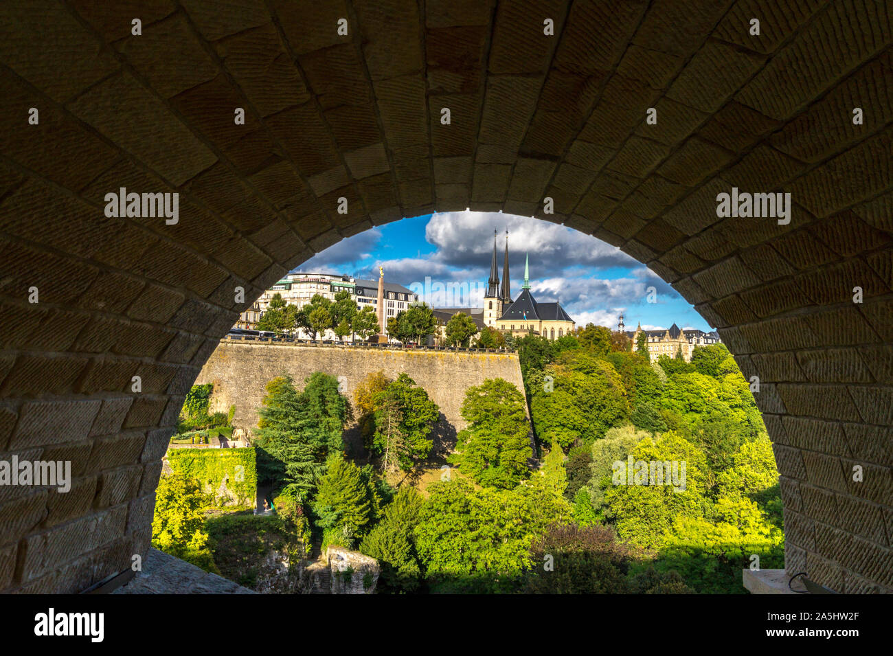 Luxembourg city seen through an arch of Adolphe Bridge, by Paul Séjourné, 1900-03, Grand Duchy of Luxembourg Stock Photo