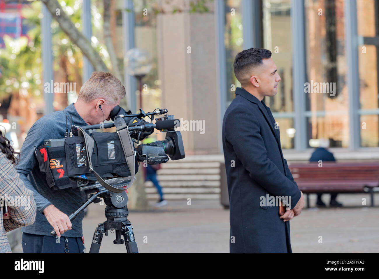 Channel Seven (Sydney) Sunrise program reporter Shaun White recording an interview outside the Supreme Court in Queens Square, Sydney, Australia Stock Photo