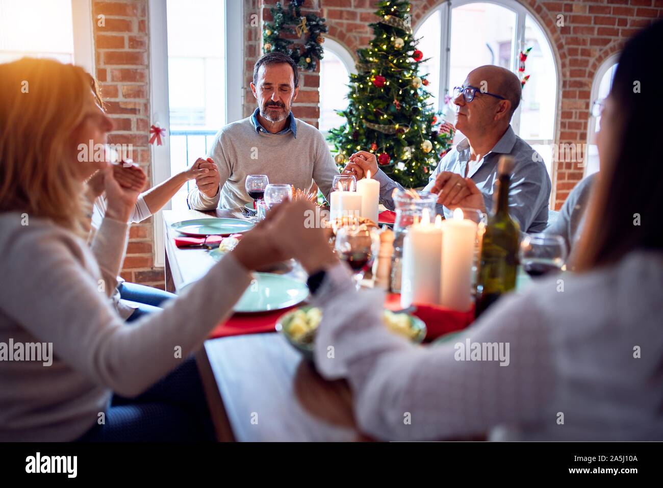 Family praying together meal dining hi-res stock photography and images ...