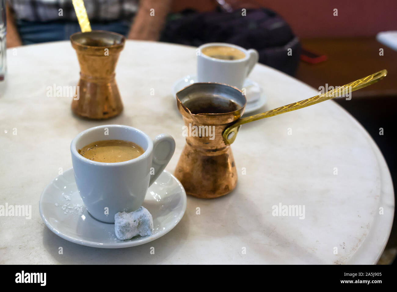 https://c8.alamy.com/comp/2A5J905/traditional-greek-coffee-served-with-brass-pot-and-sweet-loukoumi-taken-in-athens-2A5J905.jpg