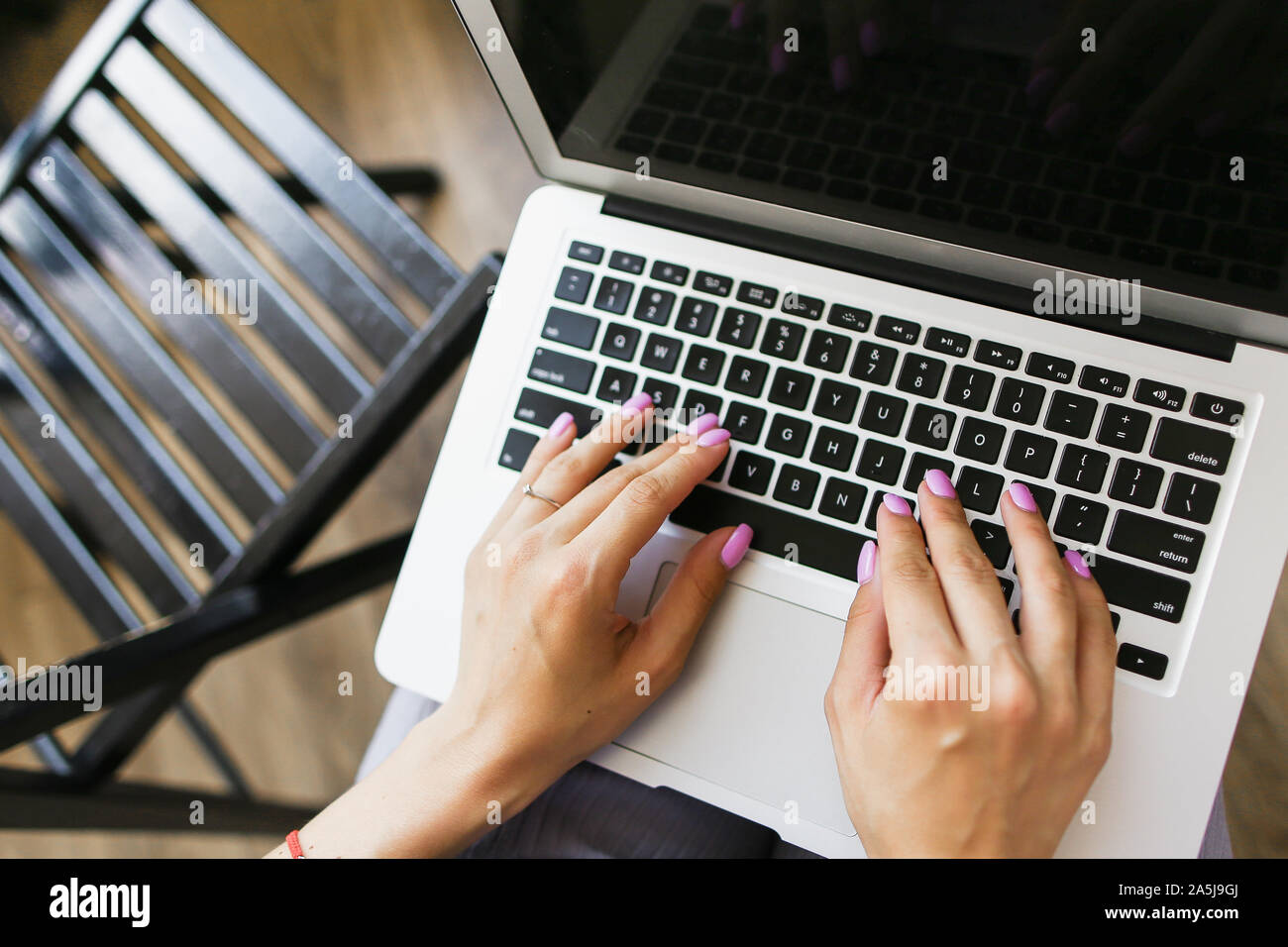 Closeup hands typing on laptop keyboard. Stock Photo