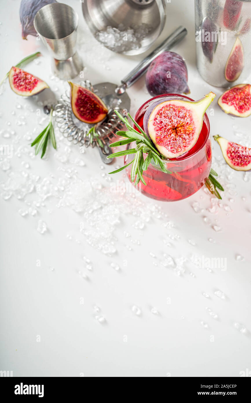 Fig autumn alcohol cocktail with cognac or liquor, rosemary, figs and