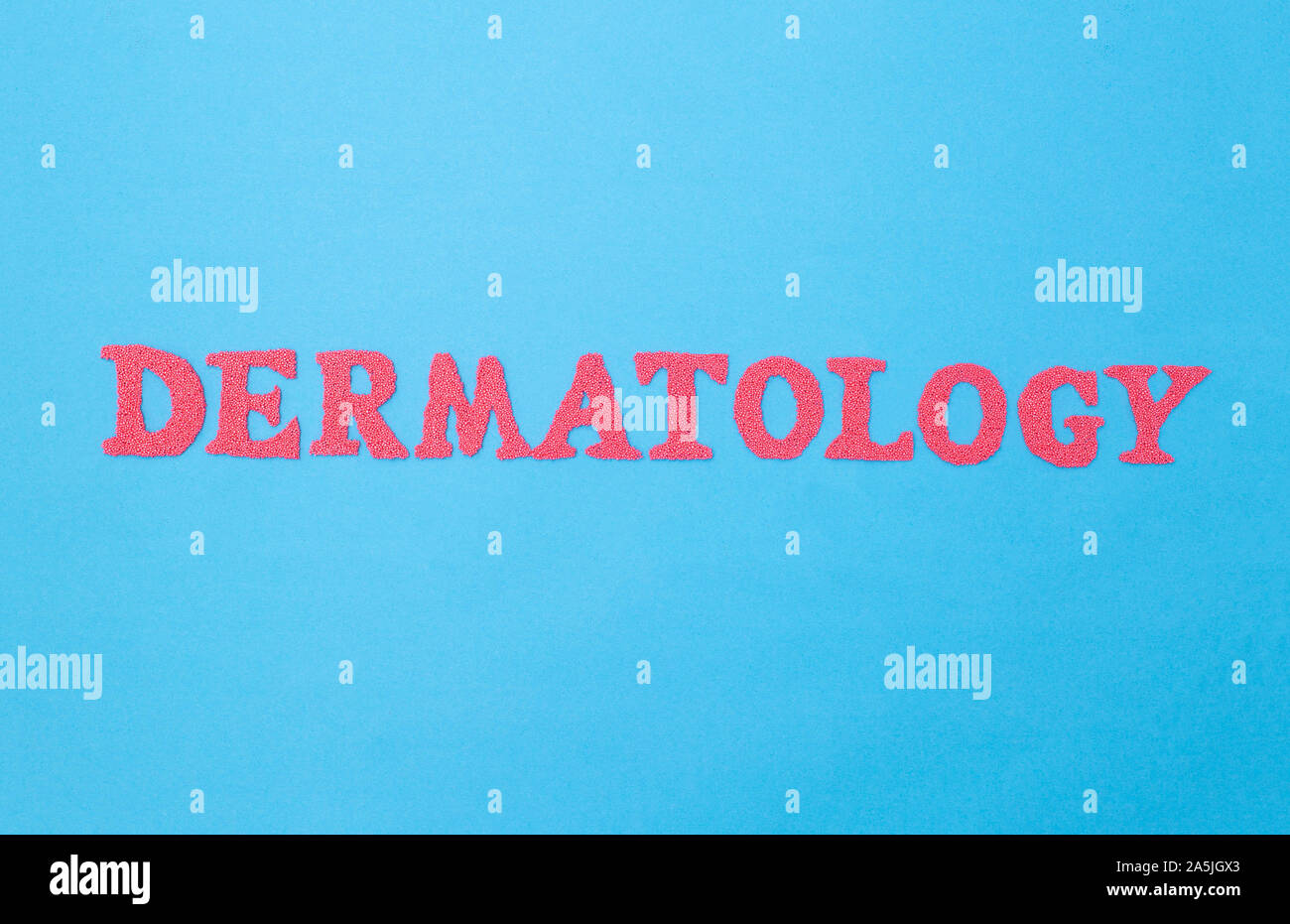 The word dermatology on a blue background. Concept section of medicine ...